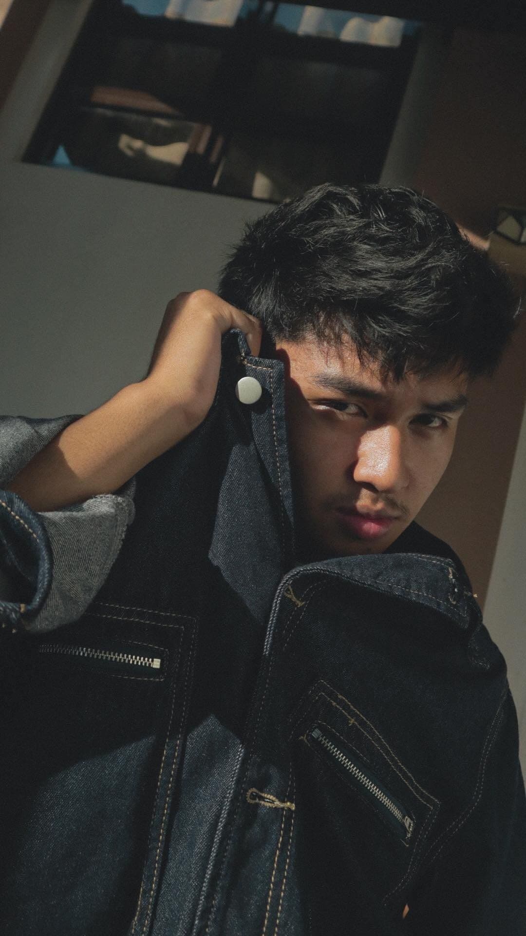 Mathheuw in a denim jacket