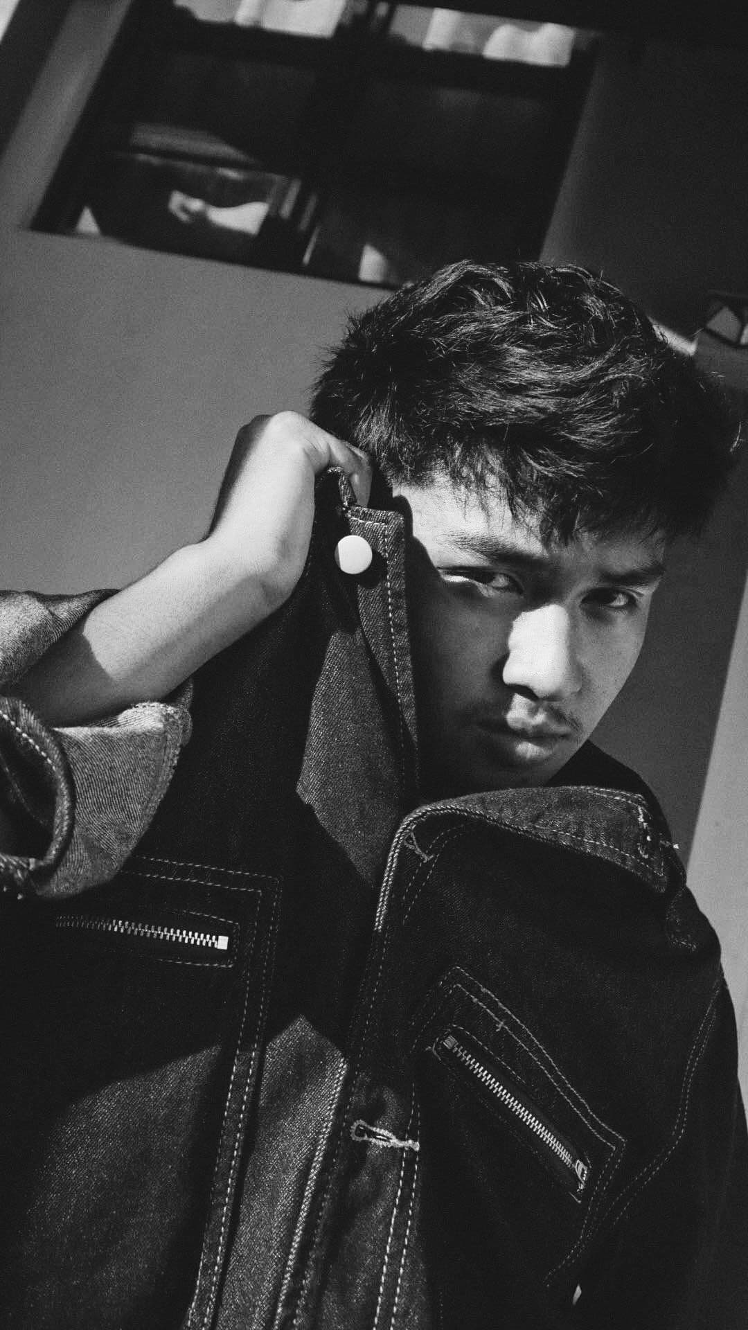 Black and white portrait in a denim jacket