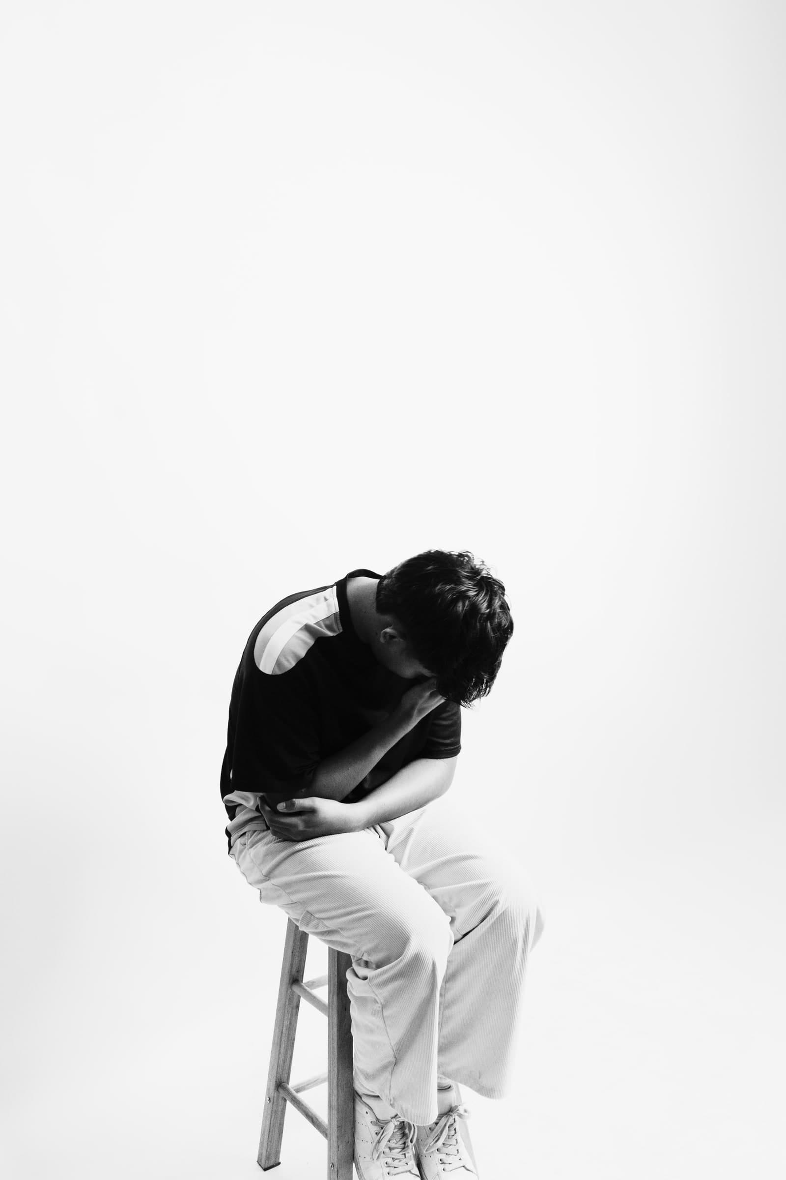 Portrait on a white stool